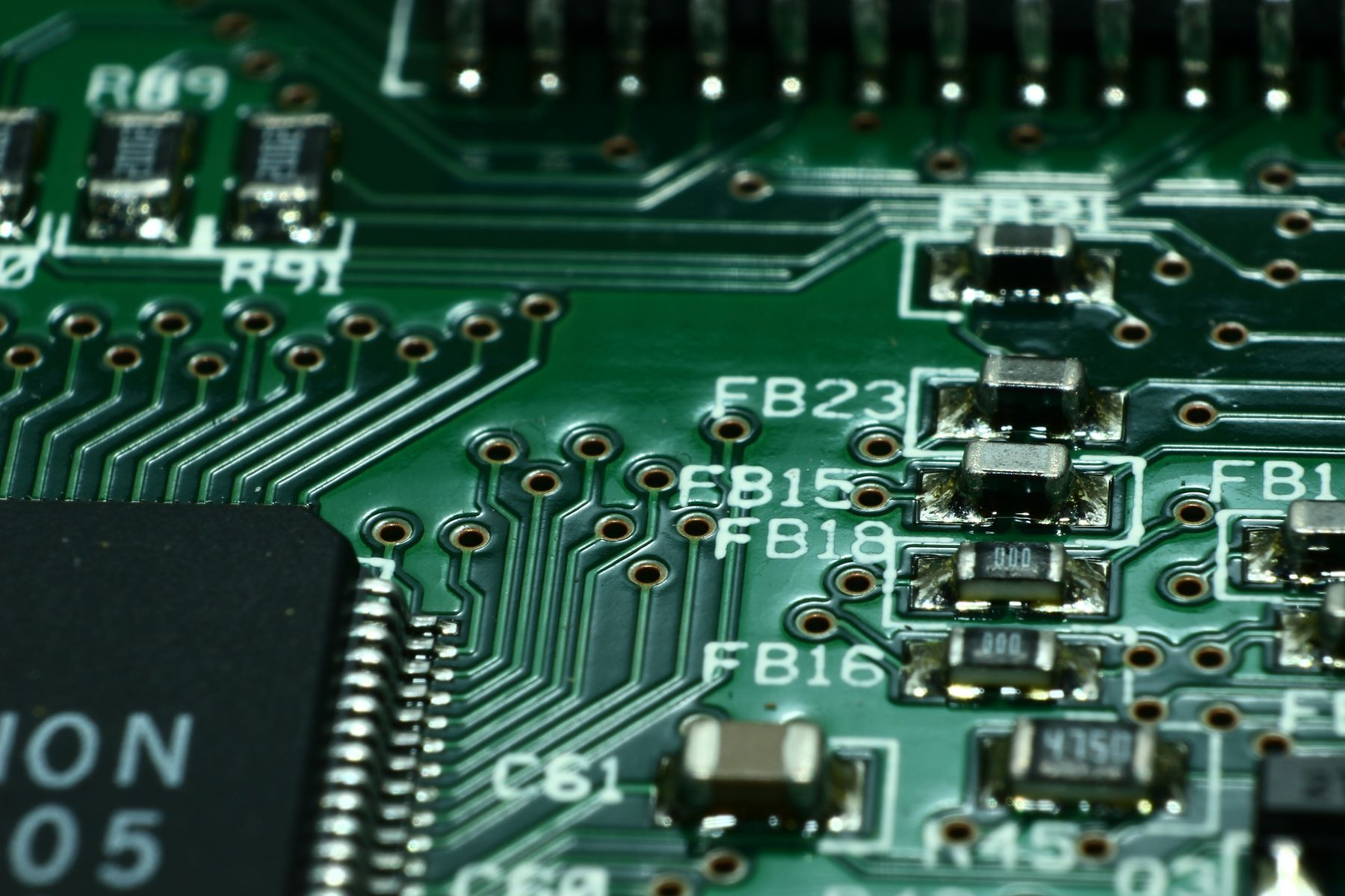 Macro photograph of components and traces on a printed circuit board